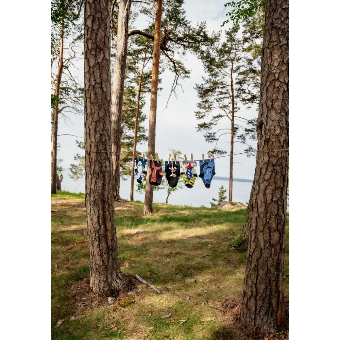 Muumi Hilpeä Haisuli -sukat lasten musta
